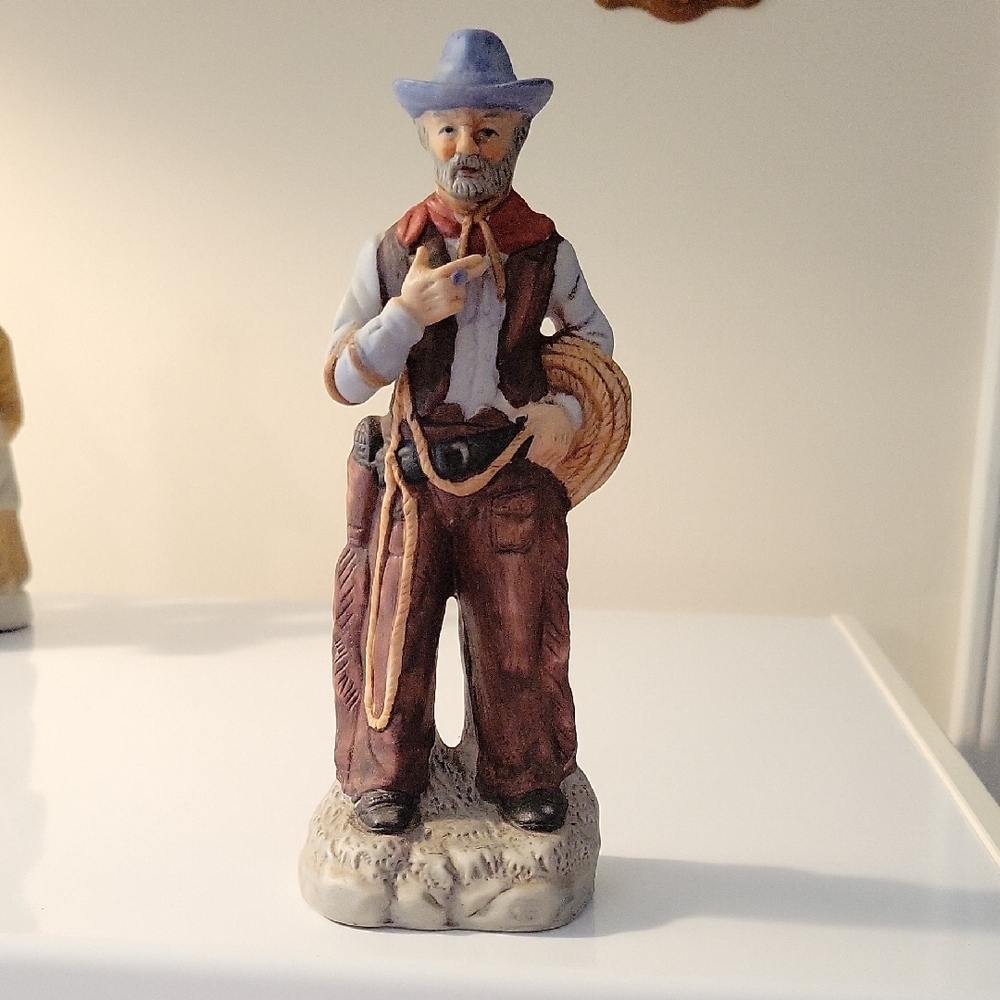 Cowboy Figurine with Blue Hat and Brown Outfit